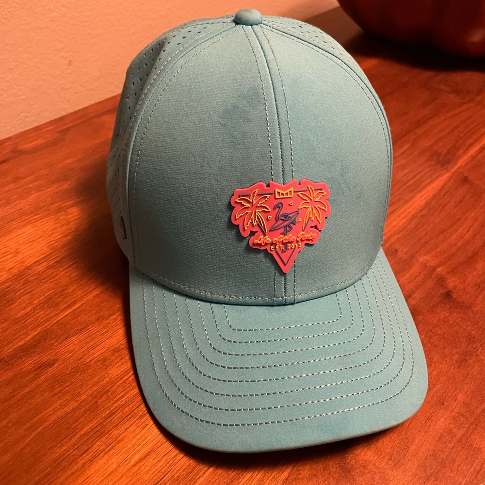 Melin A-Game Teal and Black Cap